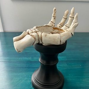 Skeleton hand candle holder